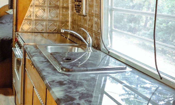 Poteau House | Cozy Vintage Airstream among the pines on World's Highest Hill. Pet-Friendly!