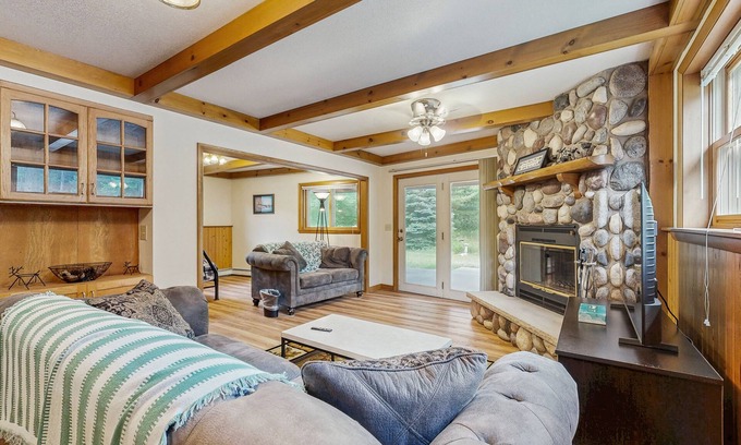 Friendship House | Cozy wooded duplex w/WiFi, full kitchen, shared W/D & near lakes & trails