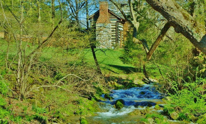 Raphine Cabin | Creekside historic log cabin with all modern amenities at historic Wade's Mill