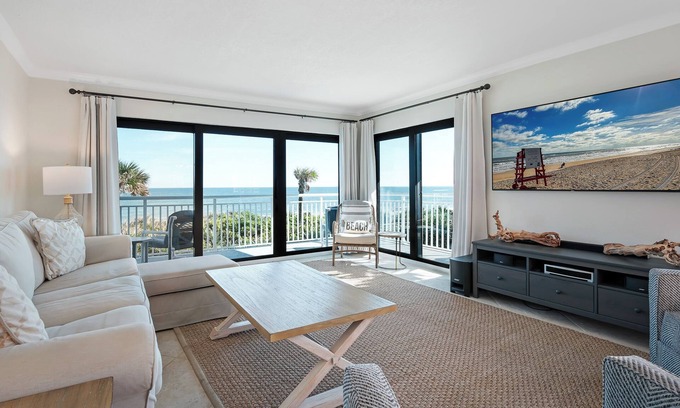New Smyrna Beach Condo | Direct oceanfront corner condo with large wrap-around balcony and heated pool