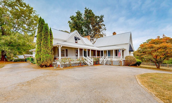 Landrum House | Dog-friendly farmhouse with hot tub, outdoor areas, & 3 fireplaces
