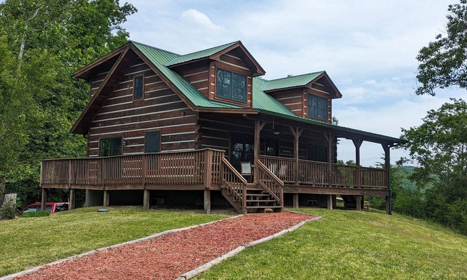 Marshall Cabin | Doolittle mountain cabin with hot tub, firepit & river views | near Asheville