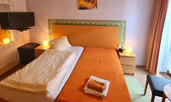 Mondsee Apartment | Doppelzimmer als Einzelnutzung - Pension Göschlberger