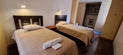 La Perla House | Dormitorio con baño compartido a 25 minutos del Apto