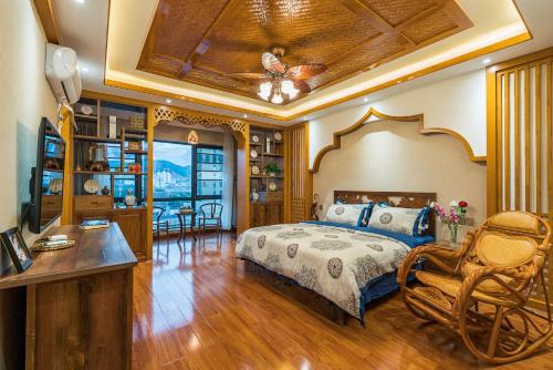 Jinghong Apartment | Doudou Meilan Fengqing Inn