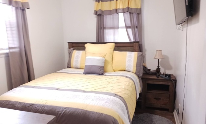 Saginaw House | Earnie's Place - Cozy 2 BR Home with Fireplace, Sports Fan Cave Garage