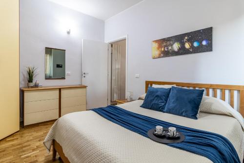 San Donato Milanese Apartment | Elegante bilocale AC, WiFi ,5 min Policlinico, 25 min Duomo Milano
