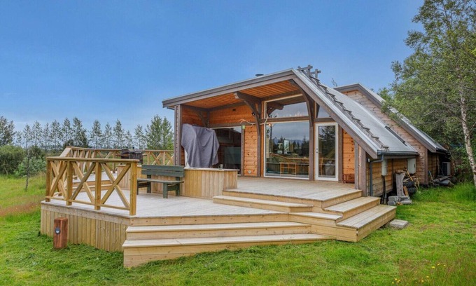 Blaskogabyggd Cabin | Embrace Nature by the River: Hot Tub & Spa Nearby!