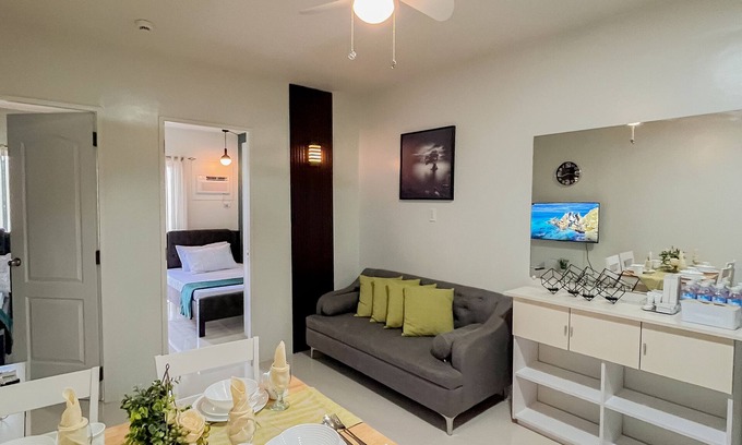 Puerto Princesa City Centre Apartment | Emerald 2 bedroom apartment with a pool, gym, and a balcony with a view