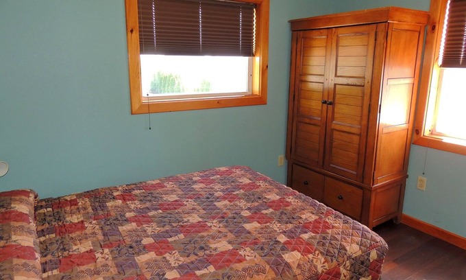 Cape Vincent Apartment | Enjoy a spectacular view of the St. Lawrence River from the Owner’s Apartment.