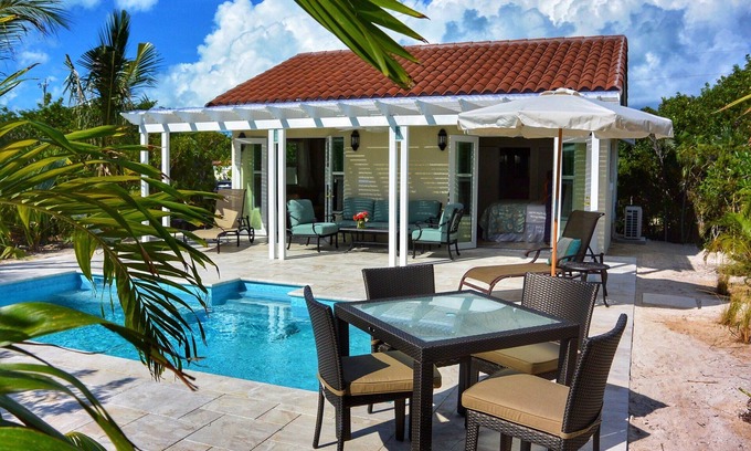 Long Bay Hills House | Enjoy Secluded Cottage w/Pool Jacuzzi Beach Front - Esencia Cottage
