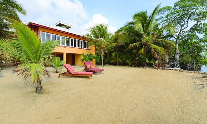 Hopkins House | Entire Oceanfront Villa with Window Wall Porch and Private Beach