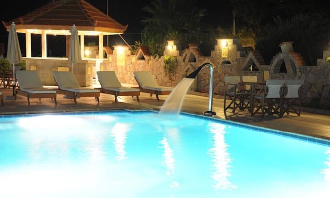 Anissaras Apartment | Entrance level renovated studio with sea& pool views