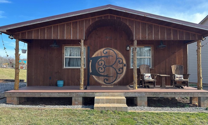 Hamptonville Cottage | Escape to a Hobbit cottage overlooking a pond with water wheel in wine country!