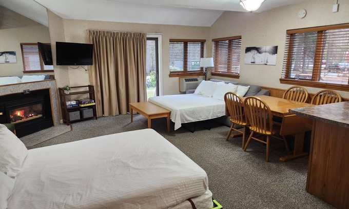 Bartlett Condo | Evergreen Lodge at Attitash Mountain base, ski, hot tubs, pool, WIFI & Fireplace