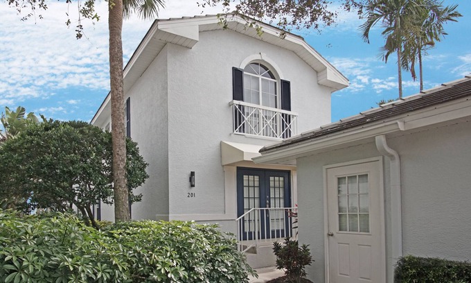 Pelican Bay Condo | Exclusive Pelican Bay, 2 BR + Den with Garage, 2nd Floor Unit in Barrington Club