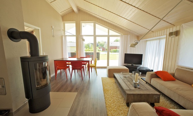 Wesselburenerkoog House | Exclusive wooden house with high sense right on the North Sea dike