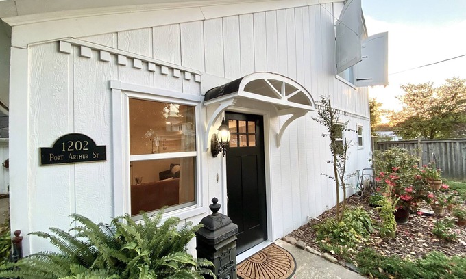 Mena Cottage | Experience History in an original Carriage House located behind a Colonial home.