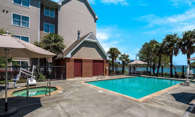 Oyster Point Hotel | Explore the Best of the City! Free Breakfast, Free Shuttle, Full Kitchen!