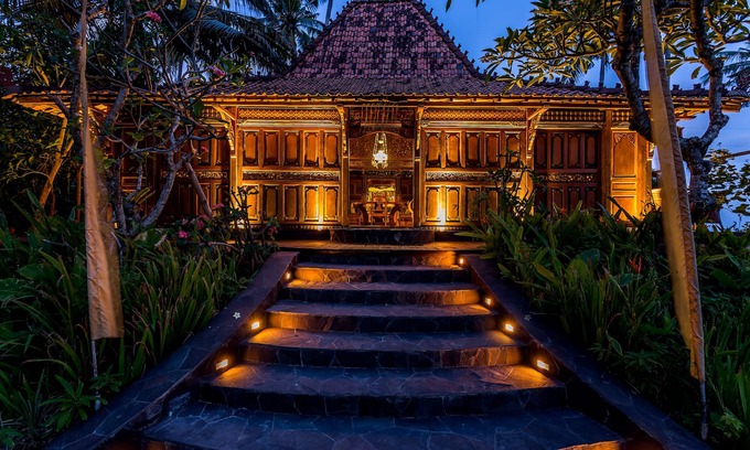 Jasri Villa | Exquisite beachfront joglo in lush coconut grove