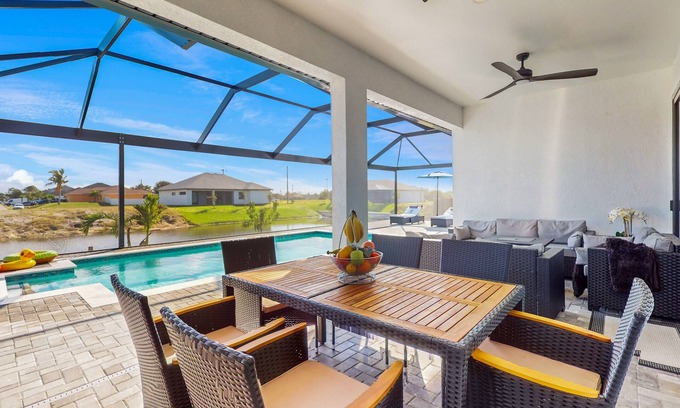 Diplomat House | Exquisite riverfront home with pool, lanai, fireplace, W/D, 7 dog-friendly
