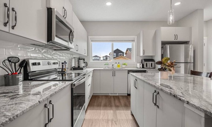 Airdrie House | Extra Large Sleeps 14 » Air Conditioning » BBQ