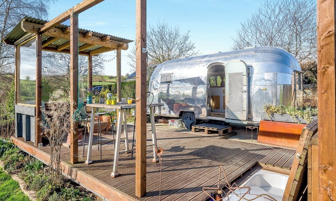 Hereford Cottage | Fabulous Airstream with sunken bath in the decking, perfect for that romantic break away.
