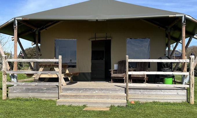 Les Arquets Cabin | Family friendly glamping tents: sleep 6, stunning sea and rural views