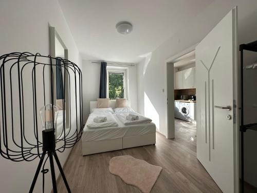 Ebreichsdorf Apartment | FeelHome-GolfClub-Balkon-4 Gäste-WiFi-Smart TV