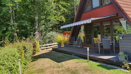 Machtlos House | Ferienhaus am Wald