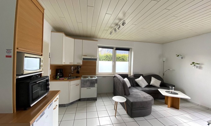 Wangerland Apartment | Ferienwohnung, 47 qm, 1 Schlafzimmer, Gemeinschaftsterrasse, Max. 4 Personen + Kleinkind
