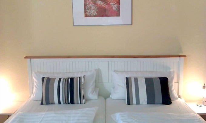 Dettelbach Apartment | Ferienwohnung mit sonniger Terrasse und gemütlichem Garten