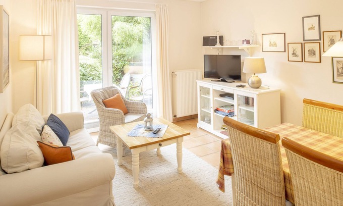 Langeoog Apartment | Ferienwohnung "töwernüst" im Schönen Freesenhoff an der Hafenstraße am Ortsrand