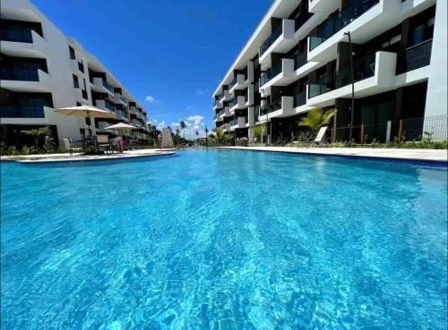 Porto de Galinhas Apartment | Flat em Muro Alto Porto de Galinhas com Piscina, Ar-condicionado e Cozinha Equipada