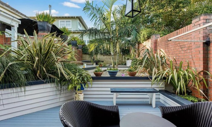 Epsom House | Flora and Fauna Unit with garden and deck