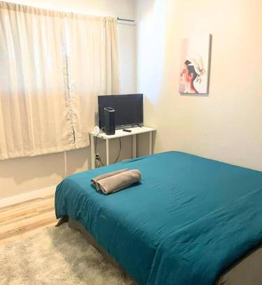 West Edmonton House | Flowealth Suites - Private Rooms Near West Edmonton Mall