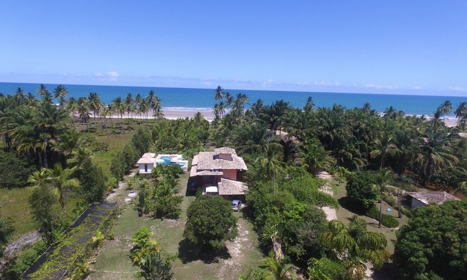 Ponta do Ramo House | Foot in the sand and swimming pool, 05 suites km 25 Ilheus Itacaré