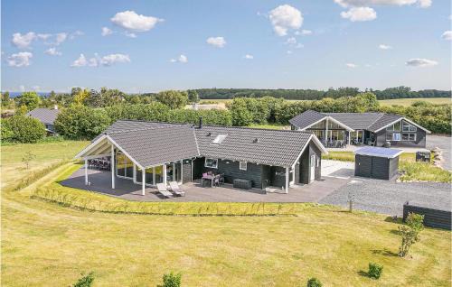 Skastrup House | Four-Bedroom Holiday Home With A Fireplace In Bogense
