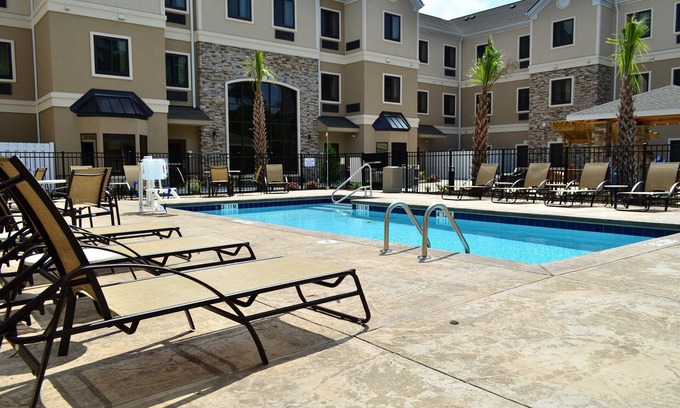 Jacksonville Apartment | Free Breakfast Buffet. Pool. Studio w/Kitchen Close to Marine Corps Air Station.