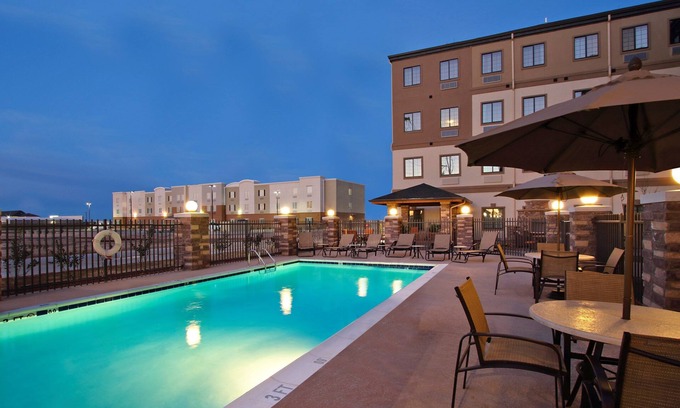 Odessa Condo | Free Breakfast. Outdoor Pool. Gym. Near the University of Texas Permian Basin!