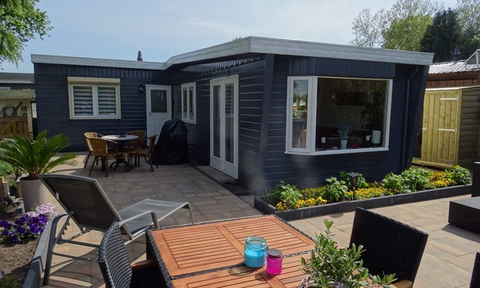 Terwolde House | Freestanding chalet for four persons, fully furnished. Located at the water.