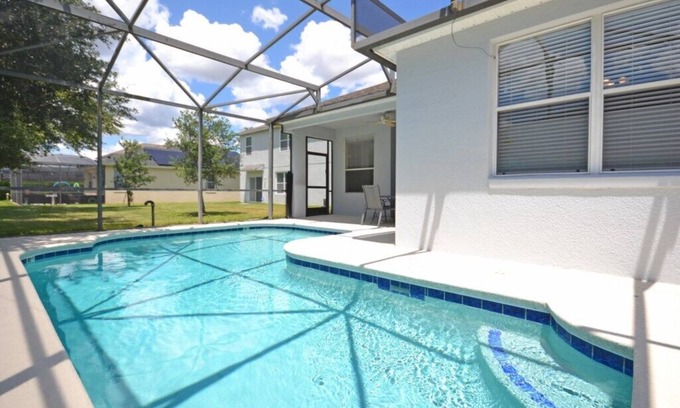 Haines City House | Freshly furnished home in gated community with private west facing pool!