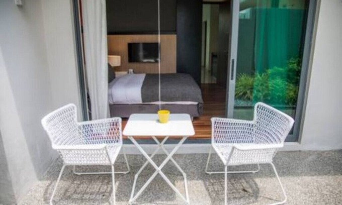 Bedok House | Garden master room with pool