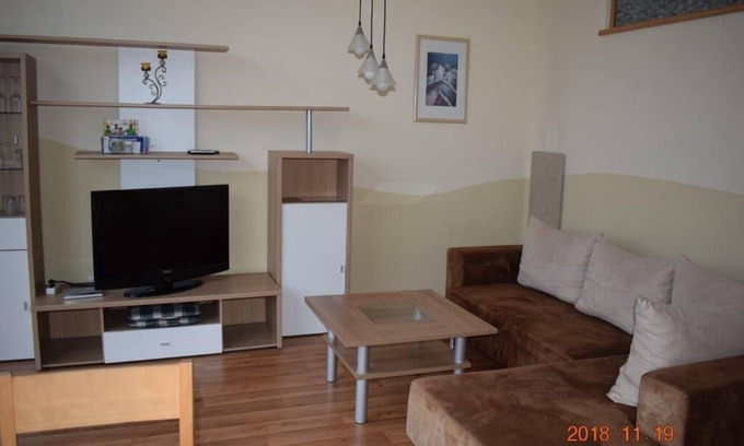 Bergrheinfeld Apartment | Gemütliche Ferienwohung (49qm) mit Balkon und Ausblick über Mainufer