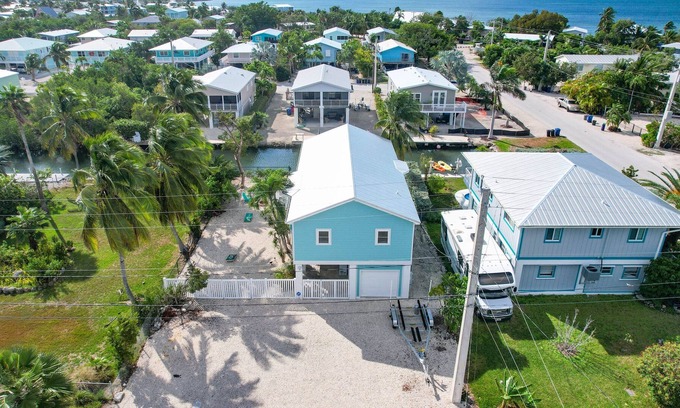 Cutthroat Harbor Estates House | Ginger's Paradise, 3 Bed, 2 Bath Canal Front Home in Cudjoe Key