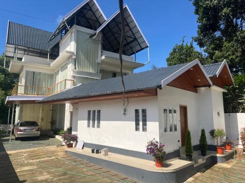 Chithirapuram Bed & Breakfast | GMG Gardens Homestay Munnar