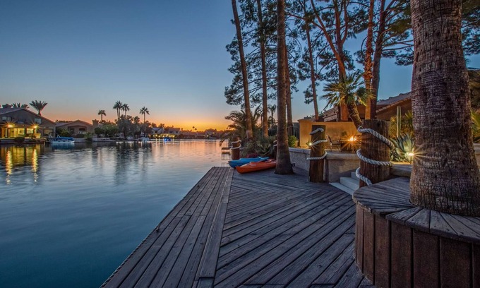 Crystal Shores House | GORGEOUS Val Vista Lake VIEW: Htd PVT POOL, Spa, Putt Green, Kayaks, Bikes, Fishing