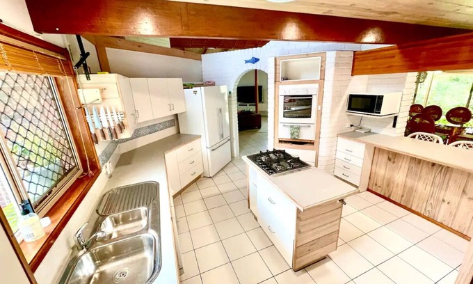 Yamba House | Great for families! “River Palm” Spacious, private, riverside retreat.