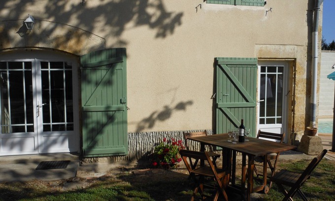 Castelnau-d'Auzan Cottage | Green Shutters Gite In SW France. Village Location. Heated Swimming Pool.