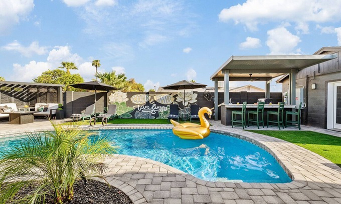 New Papago Parkway House | Group Fun HQ with Hot Tub + Bar, Heated Pool, Game Room & Lounge Near Old Town